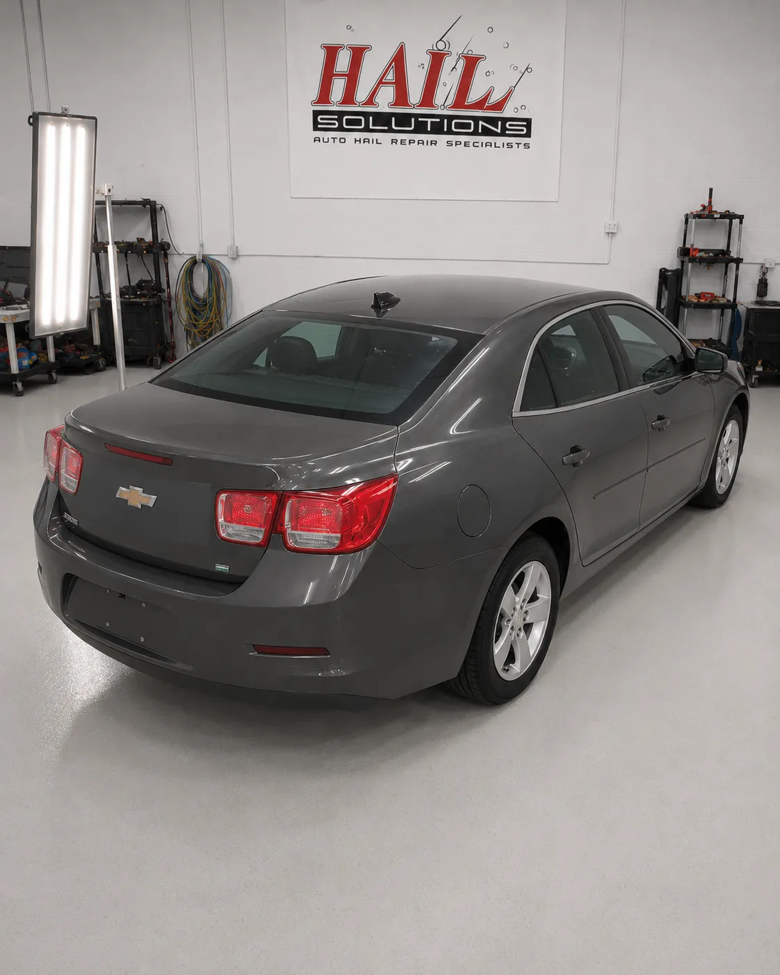 Detail photo of 2015 Chevrolet Malibu — Ashen Gray Metallic hail damage repair in Topeka, KS