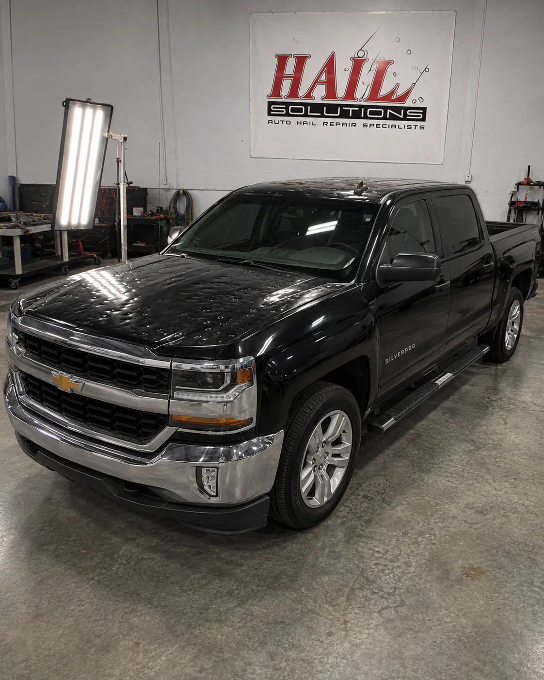 Detail photo of 2016 Chevrolet Silverado 1500 — Black hail damage repair in Ottawa, KS