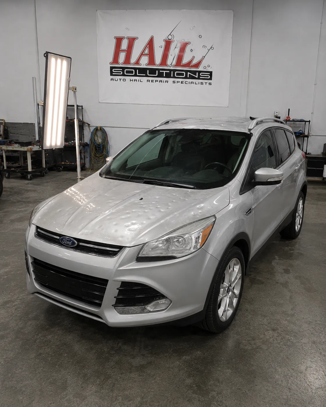 Detail photo of 2016 Ford Escape — Ingot Silver hail damage repair in Olathe, KS