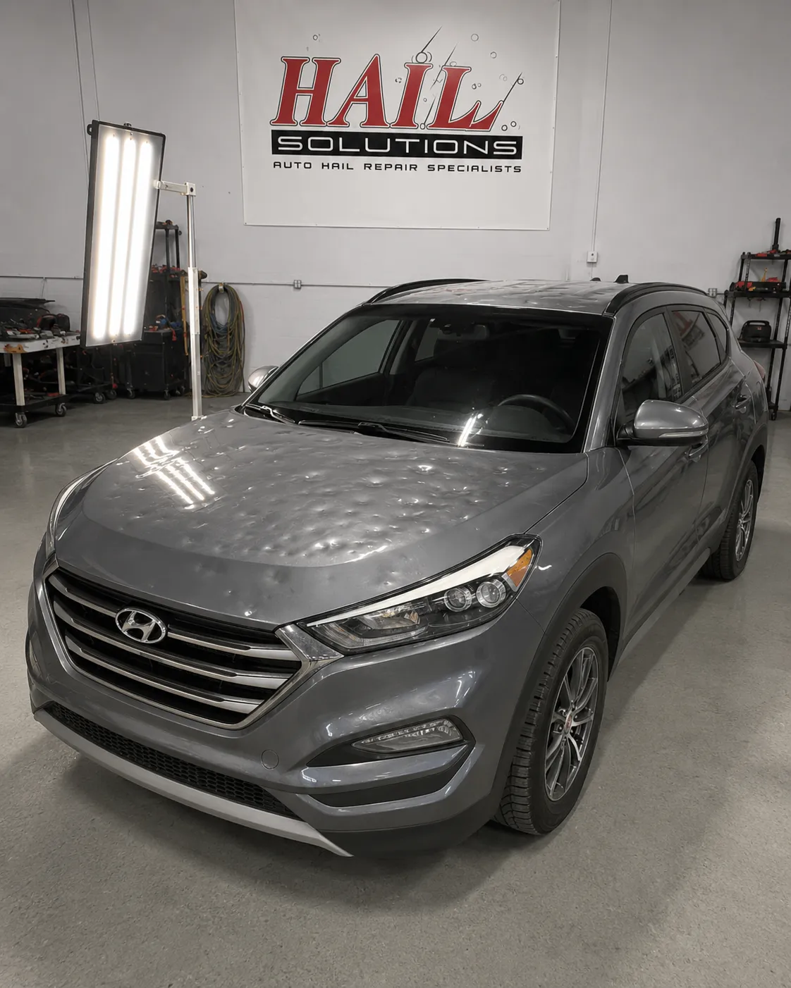 Detail photo of 2017 Hyundai Tucson — Coliseum Gray hail damage repair in Shawnee, KS