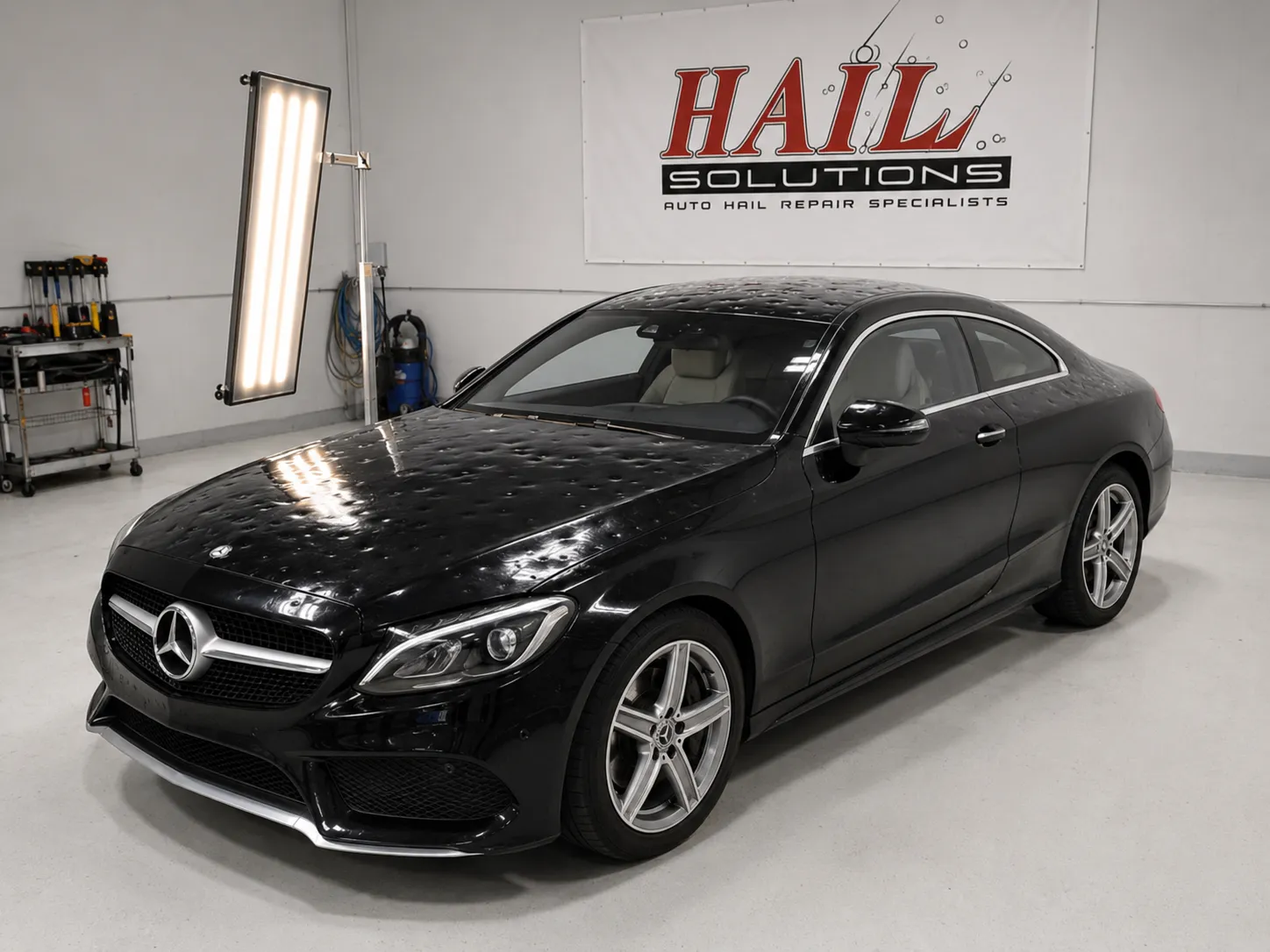 Detail photo of 2017 Mercedes-Benz C-Class — Obsidian Black hail damage repair in Edgerton, KS