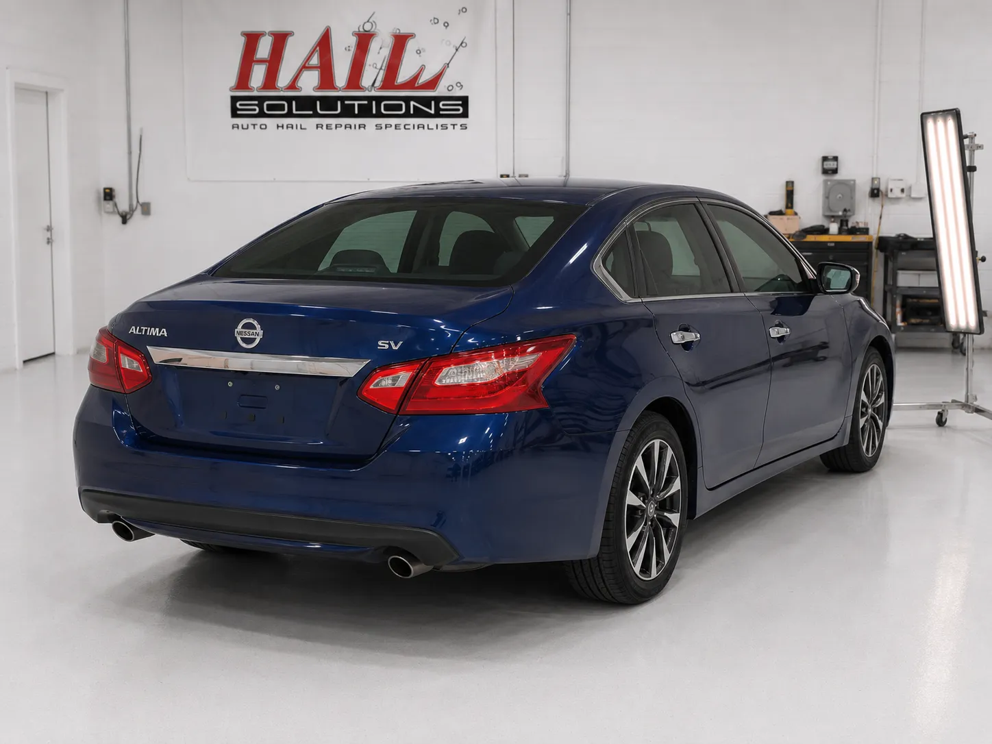 Detail photo of 2018 Nissan Altima — Storm Blue hail damage repair in Belton, MO