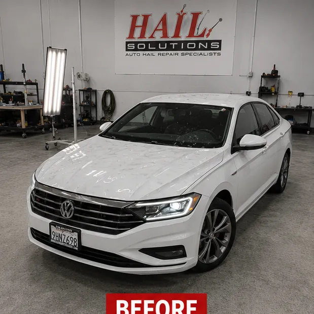 Detail photo of 2019 Volkswagen Jetta — Pure White hail damage repair in Paola, KS