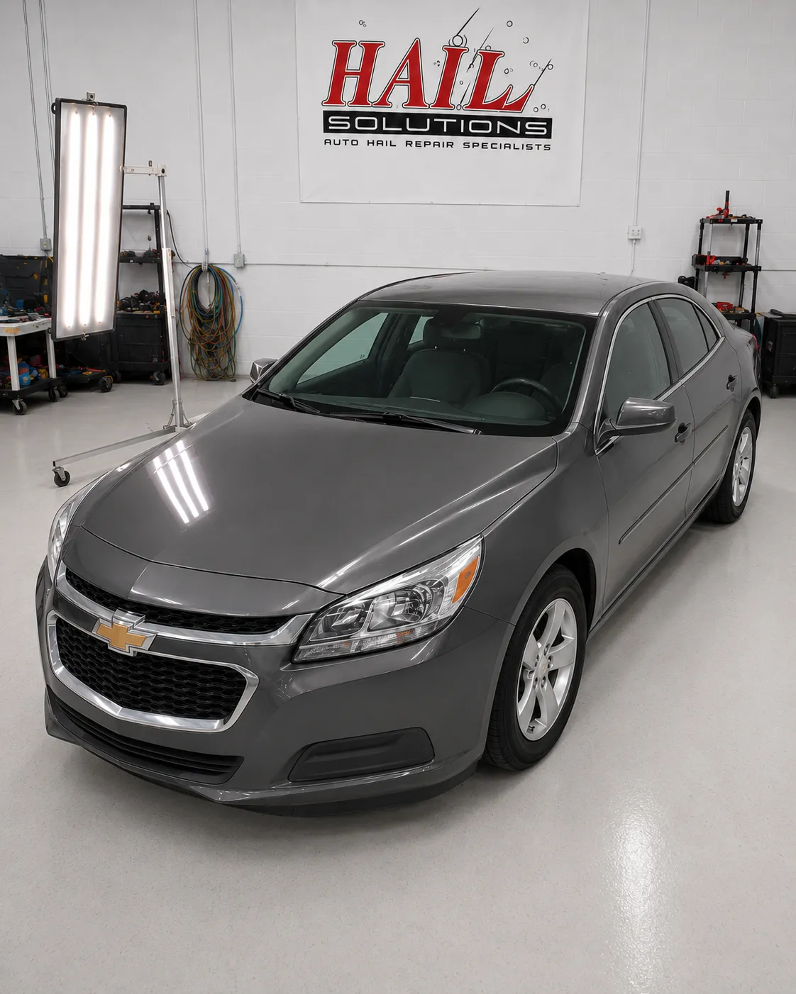 Detail photo of 2015 Chevrolet Malibu — Ashen Gray Metallic hail damage repair in Topeka, KS