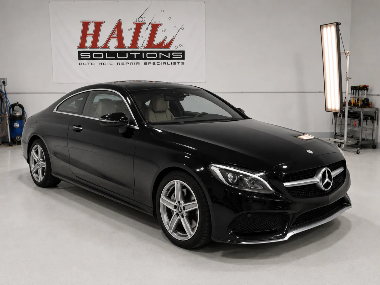 Detail photo of 2017 Mercedes-Benz C-Class — Obsidian Black hail damage repair in Edgerton, KS