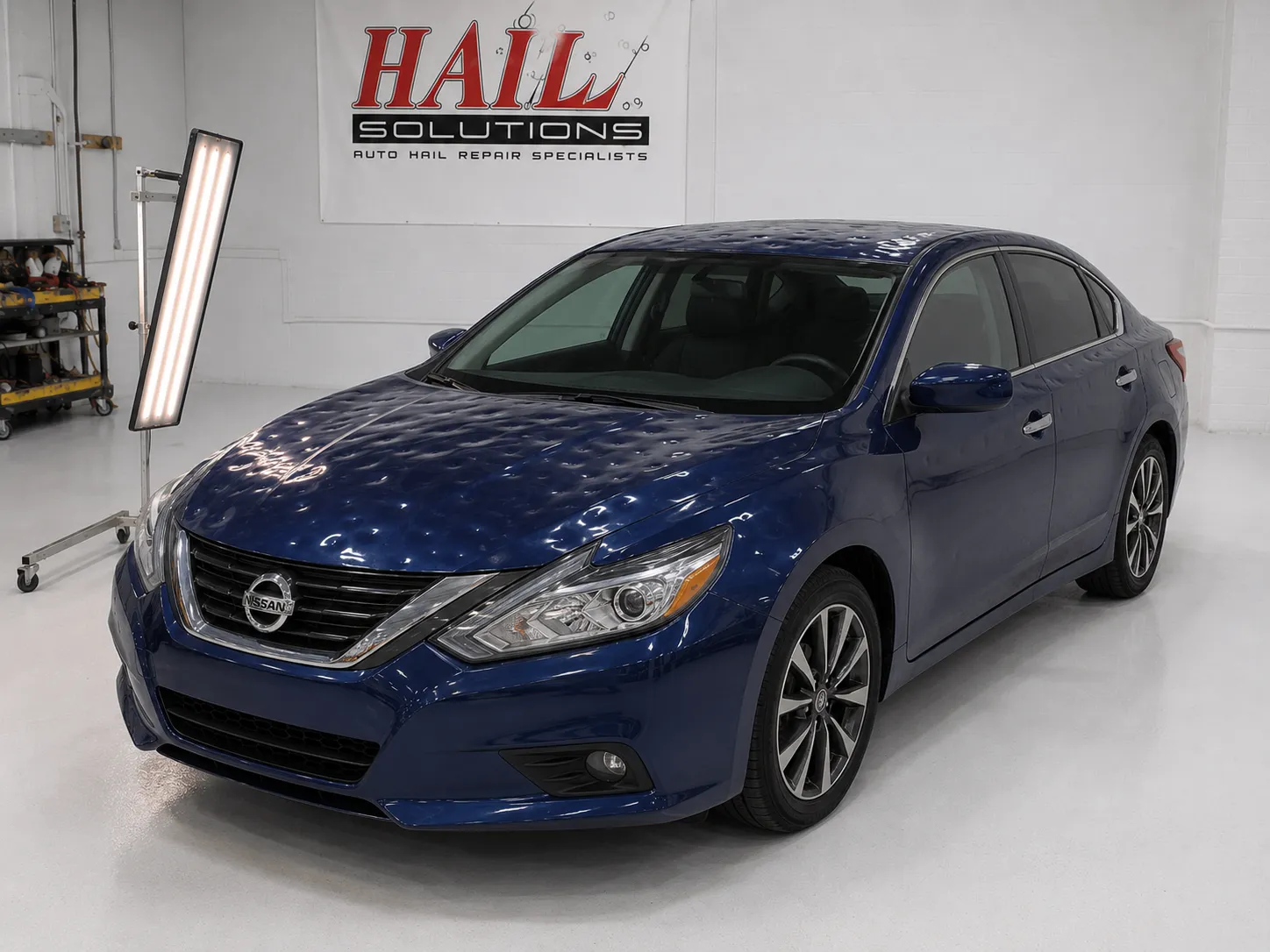 Detail photo of 2018 Nissan Altima — Storm Blue hail damage repair in Belton, MO