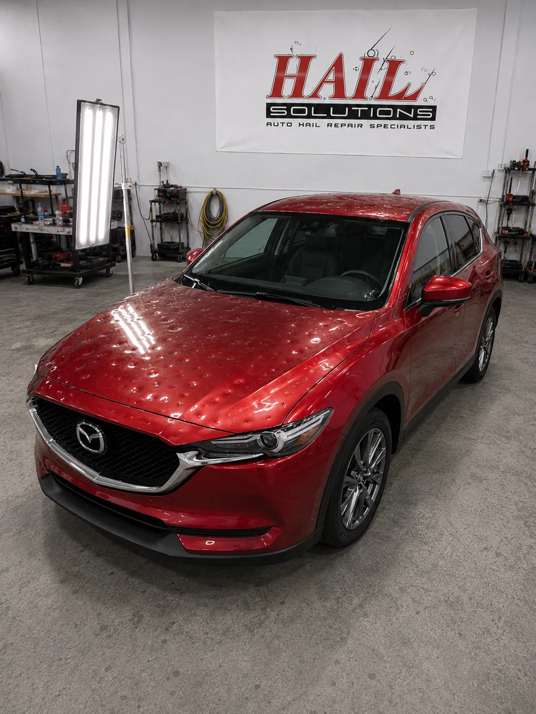 Detail photo of 2019 Mazda CX-5 — Soul Red Crystal Metallic hail damage repair in Spring Hill, KS