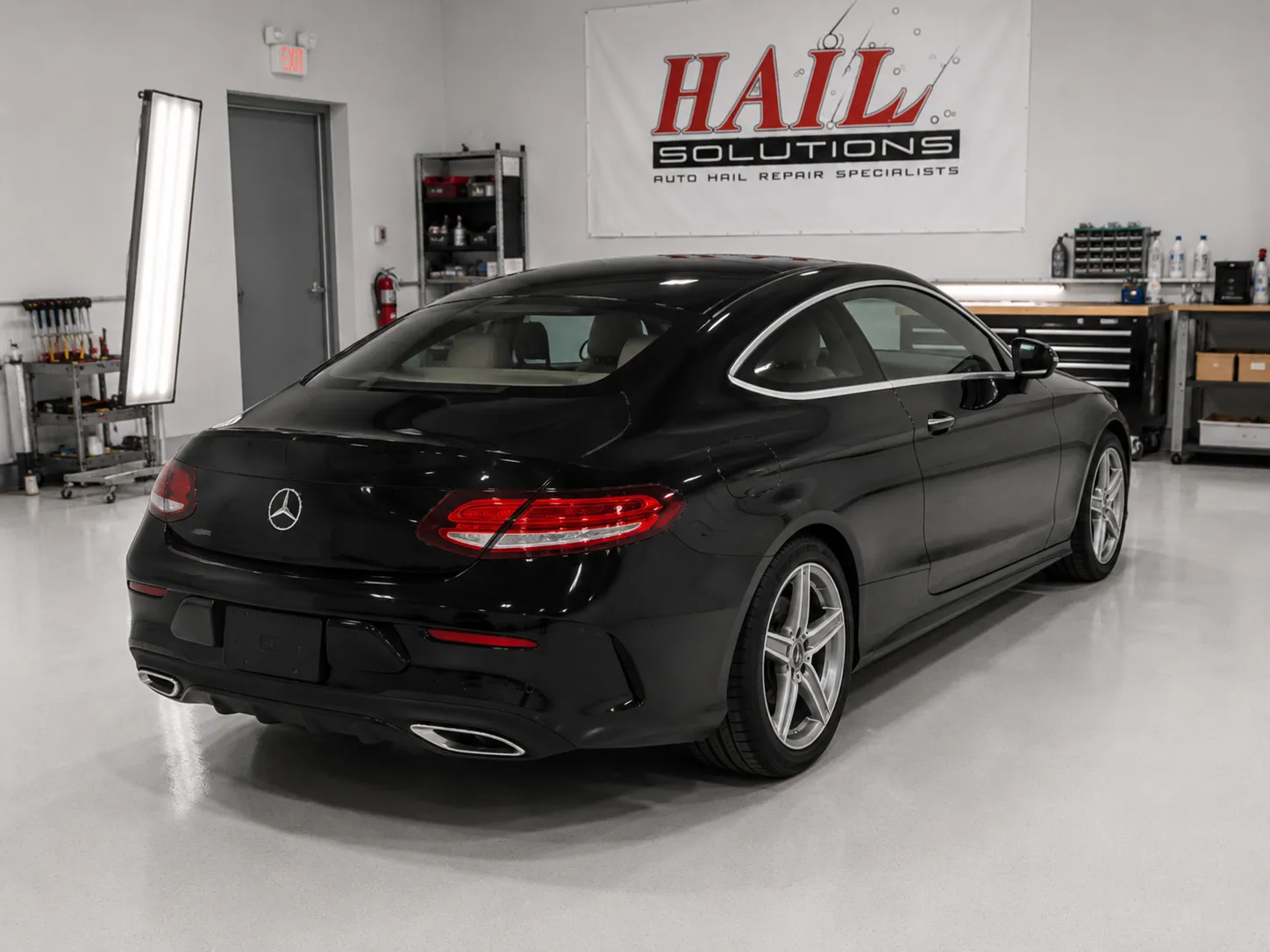 Detail photo of 2017 Mercedes-Benz C-Class — Obsidian Black hail damage repair in Edgerton, KS