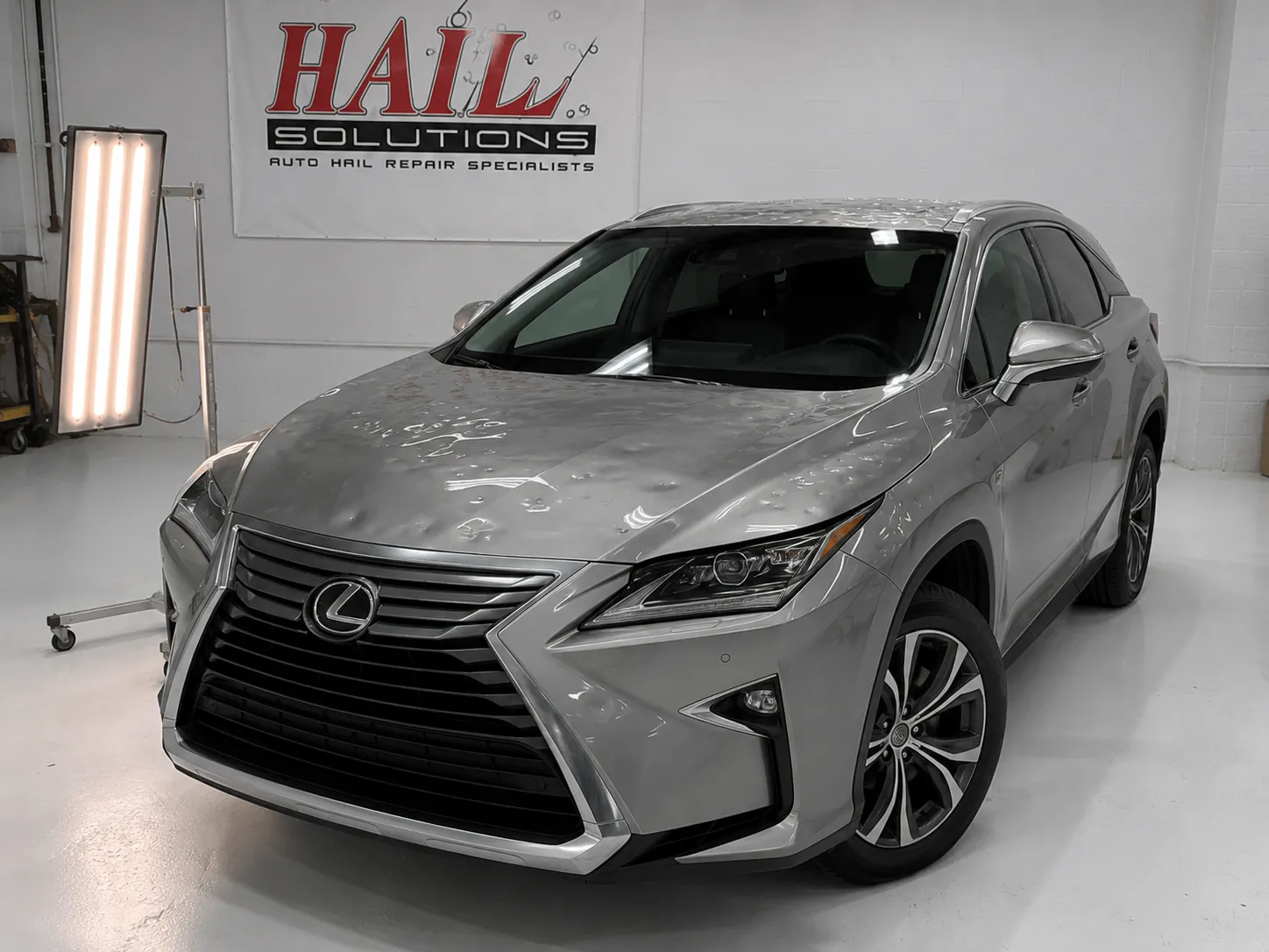Detail photo of 2018 Lexus RX 350 — Nebula Gray Pearl hail damage repair in Leawood, KS