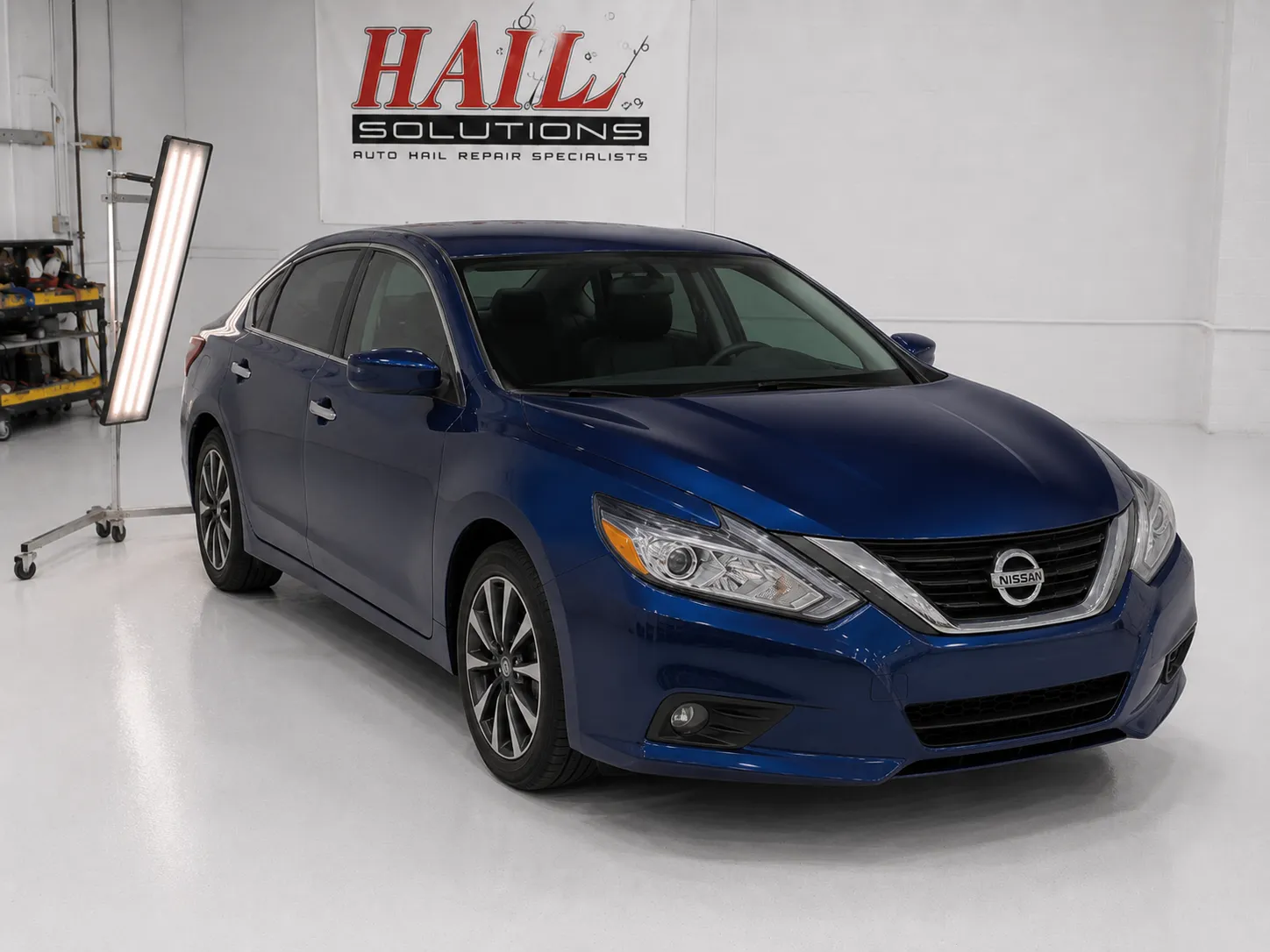 Detail photo of 2018 Nissan Altima — Storm Blue hail damage repair in Belton, MO