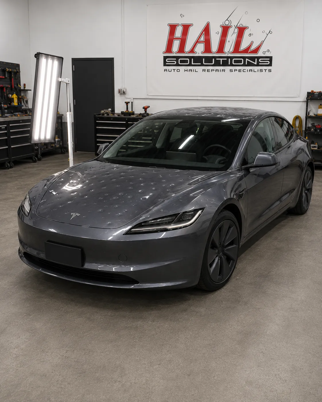 Detail photo of 2023 Tesla Model 3 — Midnight Silver Metallic hail damage repair in Leawood, KS