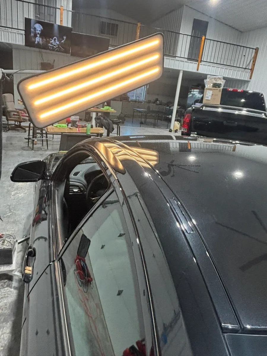 LED inspection of vehicle hail damage at Hail Solutions